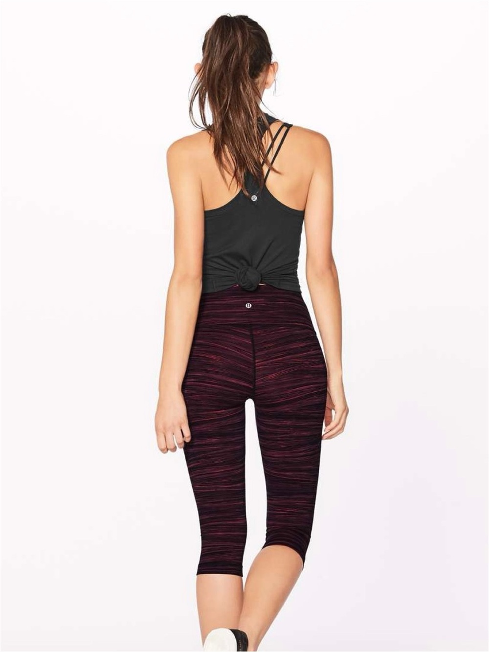Lululemon “Wunder Under” magenta/black 17” inseam athletic leggings (size 4)